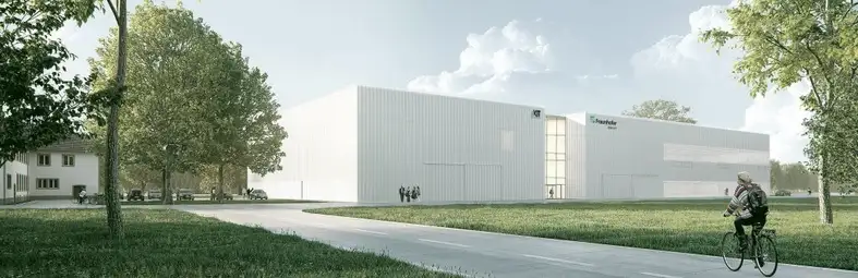Zwei weiße Gebäude auf einer grünen Wiese. Architektenstudie der künftigen Forschungsfabrik - Bild: Fraunhofer-IOSB und ICT mit KIT / Heinle, Wischer und Partner - Freie Architekten GbR